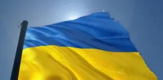 Baner w barwach Ukrainy symbolizujący wyzwolone tereny